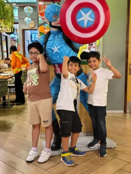 Posing with Captain America. We bring superhero fun to Tingaland for all the young heroes out there.