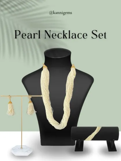 Complete your look with this exquisite pearl set. It features a multi-strand necklace, tassel earrings, and a matching bracelet to add timeless charm to every moment.
