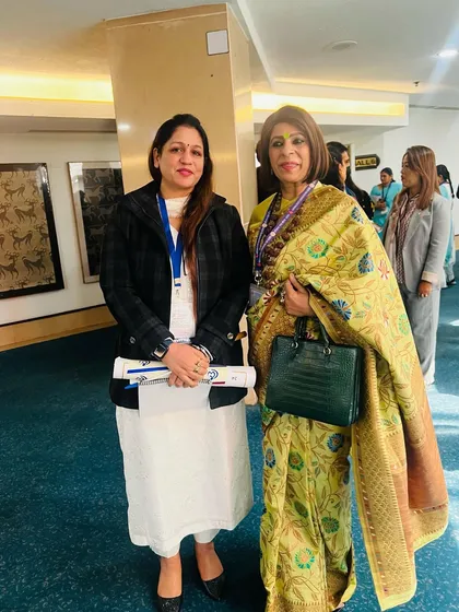 With a fellow attendee at the NCW panel discussion. These events are a great opportunity to connect with others dedicated to women's rights.