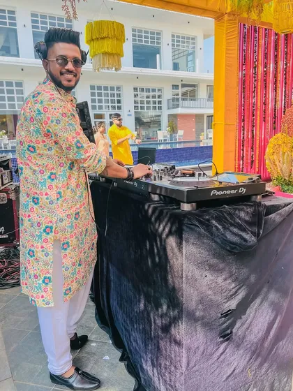 I bring the right vibe for any occasion. Here I am spinning for a daytime Haldi celebration, mixing traditional fun with modern beats. I can adapt my energy and music for any wedding event, from chill poolside parties to wild sangeet nights.