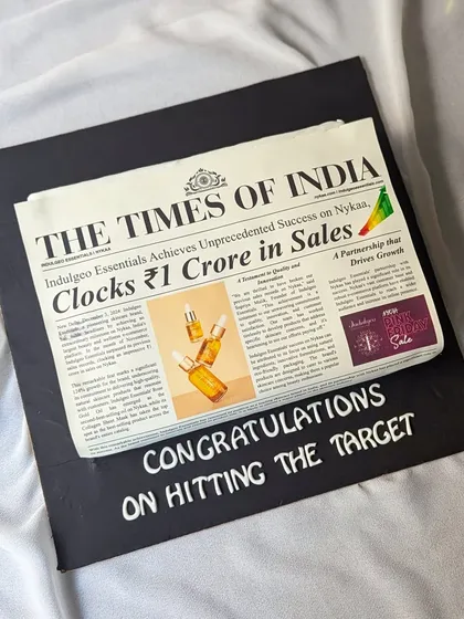 Here's a cake that truly made headlines. I designed this edible replica of a Times of India front page to celebrate a major sales milestone for Indulgeo Essentials on Nykaa. Every detail, from the headline to the article text, is meticulously crafted to honor the team's achievement.