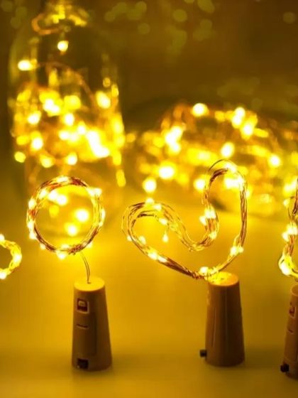 I use these flexible, battery-operated fairy lights to add a warm glow to any setup. They can be woven into backdrops, placed in bottles, or wrapped around props.