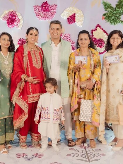 The winners of one of our fun baby shower games, posing with the happy couple. I love organizing activities that bring laughter and create lasting memories.