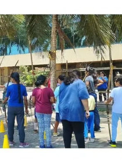 Students receiving instruction before they begin shooting. Clear communication and guidance are essential parts of my coaching.