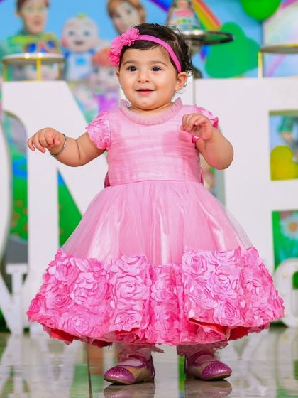 A vibrant 'Super Mario' themed birthday party, with character cutouts, a custom backdrop of the Mushroom Kingdom, and red and green balloons, ready for an adventure.