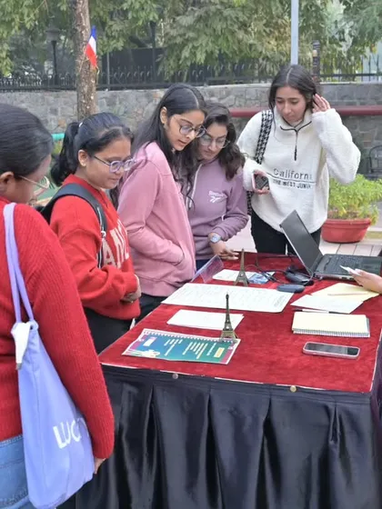 Prospective students at the registration desk during a past Open Day. Our team is always there to help you find the right course.