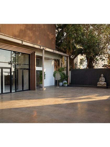 The outdoor patio and secondary entrance to the Blue Sea Banquet. We repaved the patio and designed a new stepped portal with double doors to improve flow and create a more functional entry point.