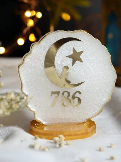 Another angle of the pearlescent resin art piece, showcasing its shimmer and the delicate details of the design.