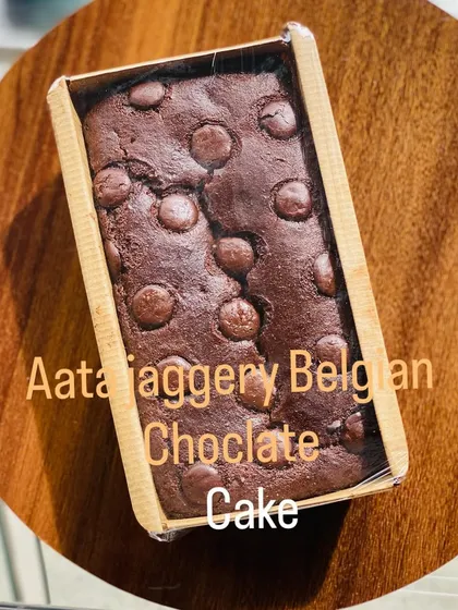 This is my healthy atta jaggery Belgian chocolate cake. It's a rich and moist loaf cake made with whole wheat flour and jaggery, topped with decadent Belgian chocolate chips.