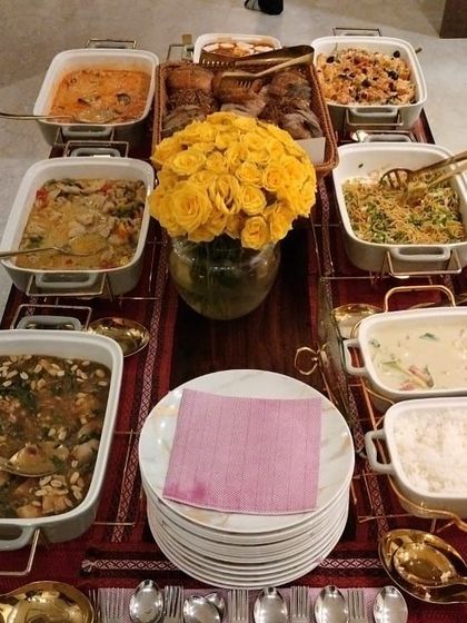 A vibrant and plentiful spread for a Lohri celebration. The menu features a mix of comforting main courses and a basket of assorted breads, perfect for a festive gathering.