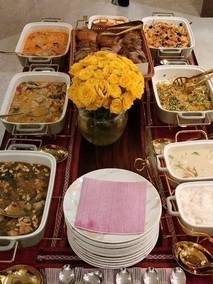 A vibrant and plentiful spread for a Lohri celebration. The menu features a mix of comforting main courses and a basket of assorted breads, perfect for a festive gathering.