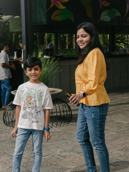 A mother and son enjoying a day out. I'm happy to provide a space where families can relax and have fun.