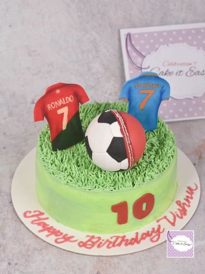 A cake for a fan of both cricket and football, featuring jerseys of their favourite players, Dhoni and Ronaldo.