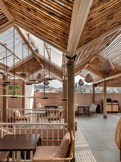 The interior of a restaurant project where we used bamboo for the ceiling and rope-wrapped columns. These natural materials are not only sustainable but also incredibly resilient, perfect for varied weather conditions.