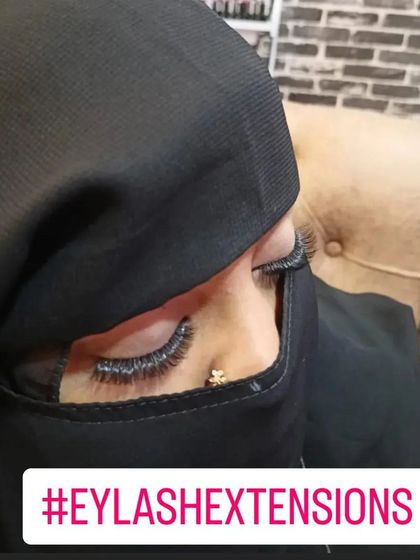 Here is an example of a very full and dramatic set of volume eyelash extensions. This style is perfect for clients seeking maximum fullness and a bold, captivating look.