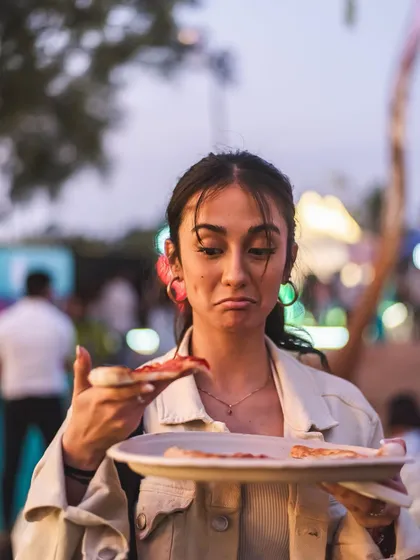 The face you make when you're down to the last slice. We bring our wood-fired pizzas to major events like Zomaland, serving up joy one slice at a time.