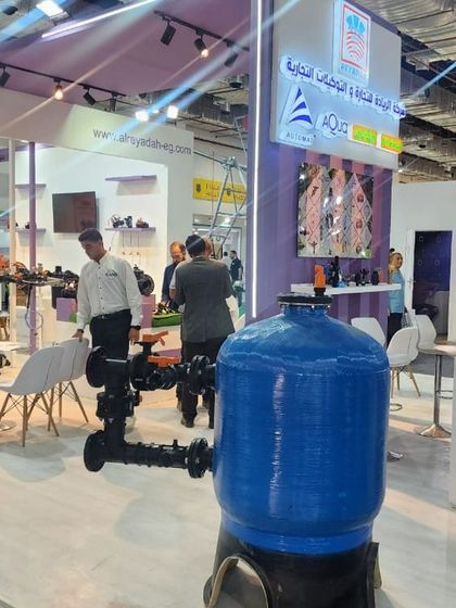 A large blue sand media filter on display at our booth during the Sahara International Agricultural Exhibition in Egypt.