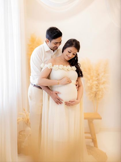 A beautiful moment between the parents-to-be, surrounded by a soft, neutral-toned setup in my studio. I love capturing these tender interactions.