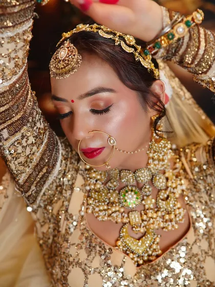 A close-up capturing the radiant skin and detailed eye work. Our HD makeup training ensures a finish that is perfect up close.