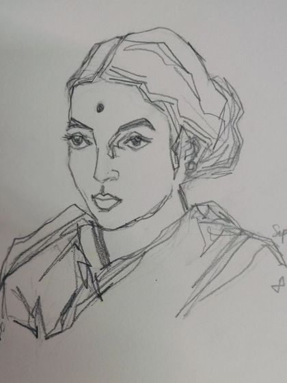 A minimalist portrait sketch. Sometimes the simplest lines can bring the most joy and capture a likeness with just a few strokes.