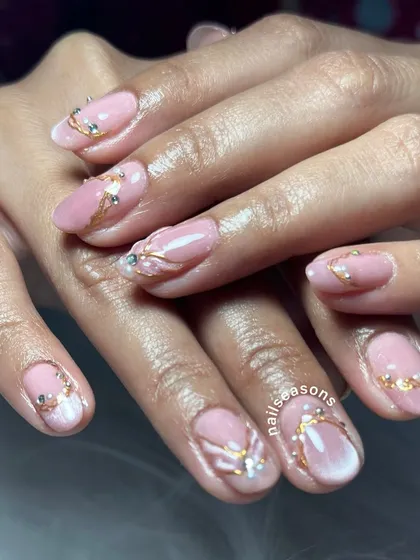 A full view of the finished bridal nails, showing how the design elements work together across both hands for a cohesive and stunning look.
