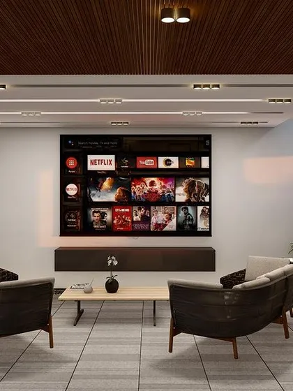 This part of the terrace lounge is designed as a media room, complete with a large screen and comfortable seating. It demonstrates the versatility of our enclosed terrace structures.
