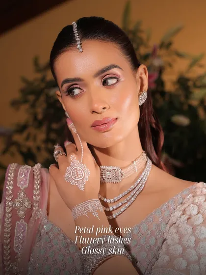 An example of my soft glam style featuring petal pink eyes, fluttery lashes, and glossy skin. This look is perfect for a bride who wants a romantic and ethereal vibe.