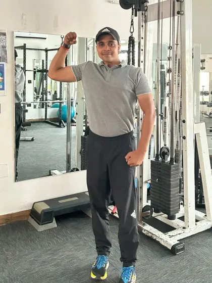Flexing in the gym.