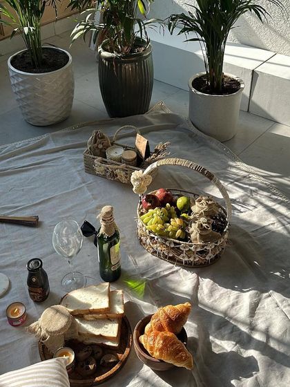 A flat-lay style shot for Shipra Shroff, creating a picnic aesthetic with props to build a brand narrative.