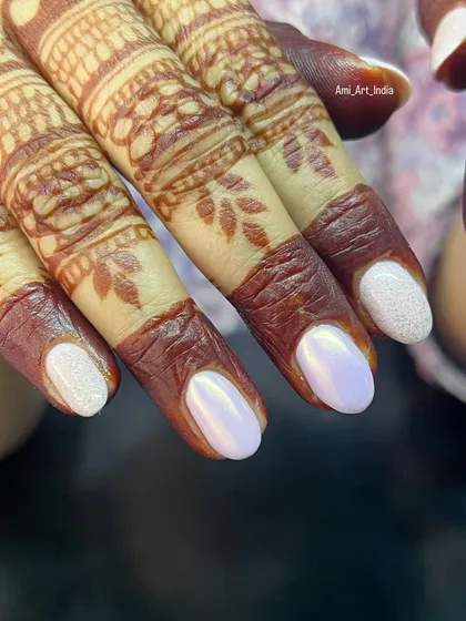 A closer look at the soft iridescence of the pearl chrome finish against the deep color of the henna.