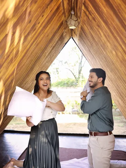 A fun and spontaneous pillow fight during a pre-wedding shoot. Moments like these are what make a shoot memorable. I believe in creating a comfortable environment where couples can be themselves, resulting in authentic and joyful photos.