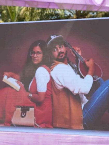 Personal touches are everything. For this carnival, I created a fun photo display featuring a retro, DDLJ-style picture of the couple.