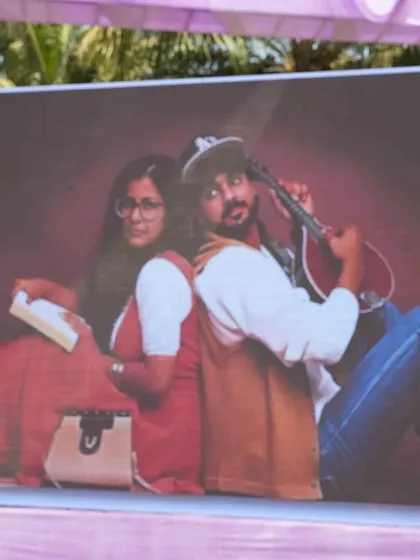 Personal touches are everything. For this carnival, I created a fun photo display featuring a retro, DDLJ-style picture of the couple.