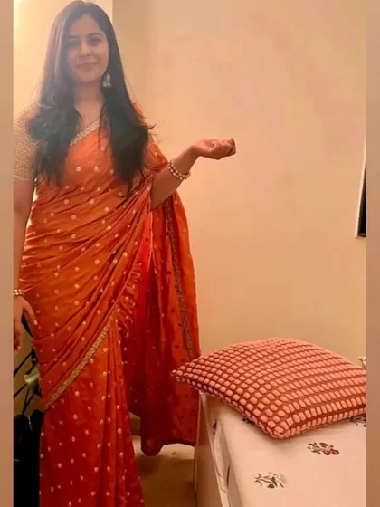 Draping for the beautiful Maulie for her friend's reception. This vibrant orange saree was perfect for the celebratory occasion.