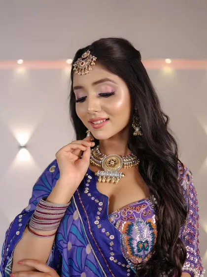 Bringing a touch of fairy tale magic to the modern world. The pink and purple eyeshadow adds a whimsical touch to this traditional look.