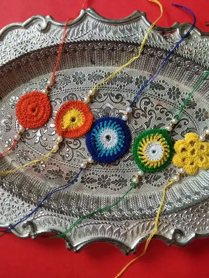 A platter showcasing some of my colorful and simple rakhi designs, ready for the festival.