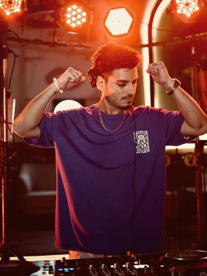 Hands up, vibes high. A candid moment of pure joy behind the decks at Playboy, Gurgaon, lost in the music and the energy of the crowd.