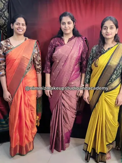 My students looking lovely after successfully draping their own sarees during a workshop.