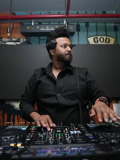Focused and ready to mix.