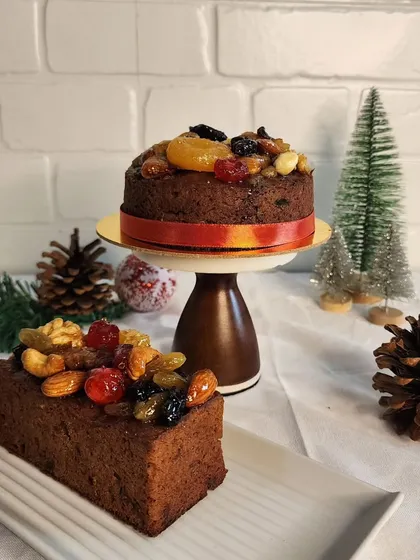 A classic Christmas Fruit Cake, packed with soaked fruits and nuts. I offer both traditional alcoholic and non-alcoholic versions to suit everyone's preference.