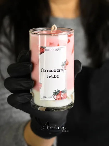 Sweet and fruity, the Iced Strawberry Latte candle is a delightful pink creation that smells as good as it looks.