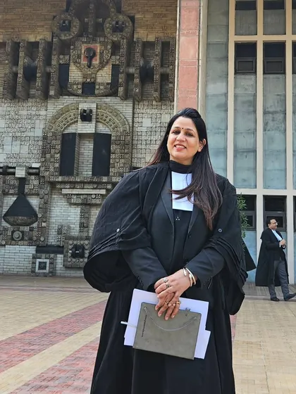A confident stance outside the court. My aim is to empower my clients to feel this same sense of confidence as we navigate their legal challenges together.