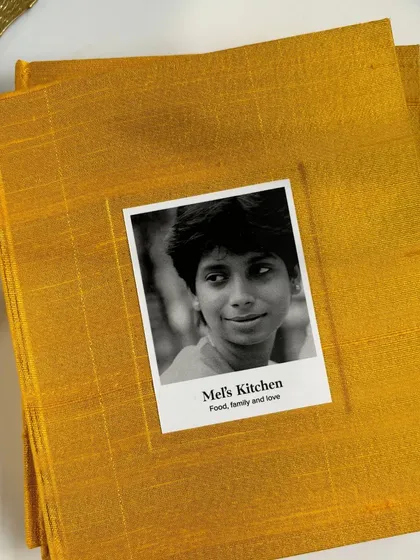 This is more than a book; it's a family's history bound in silk. Through our Andaaz publishing service, we help you create a bespoke heirloom cookbook, turning your family's precious recipes and stories into a tangible treasure that can be passed down for generations.