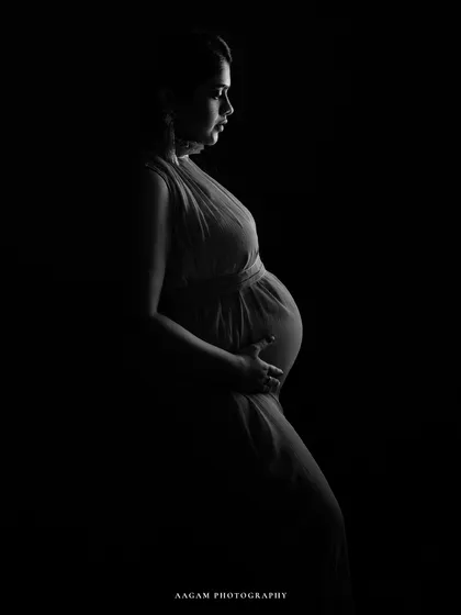 A simple, powerful silhouette that captures the universal shape and emotion of pregnancy.