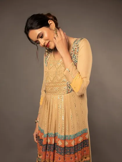 This pose shows the side and back details of the Anarkali, giving a 360-degree feel for the product.