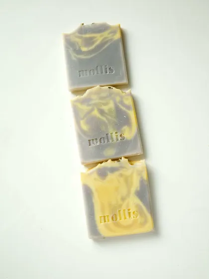 These soap ends, infused with alkanet root and turmeric, are scented with lavender and patchouli.