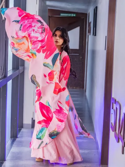 A dynamic shot capturing the movement of the outfit, with the makeup kept fresh and modern.