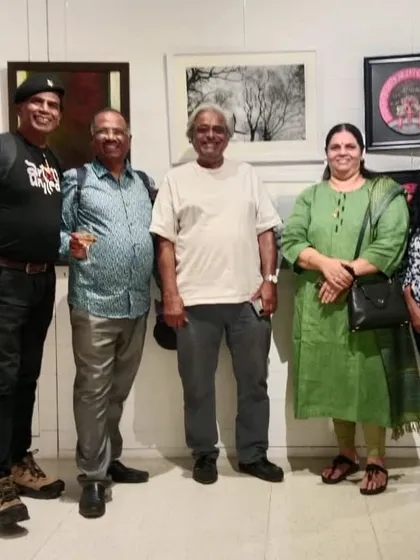 With a group of fellow artists and friends at the World Art Day exhibition.