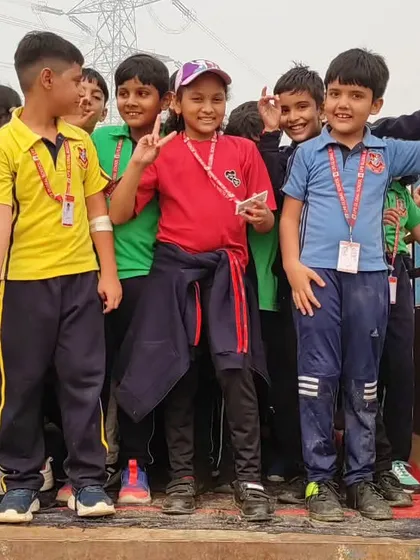 A group of boys enjoys a tractor ride at the adventure camp. The day is filled with a variety of fun and unique experiences that create lasting memories.