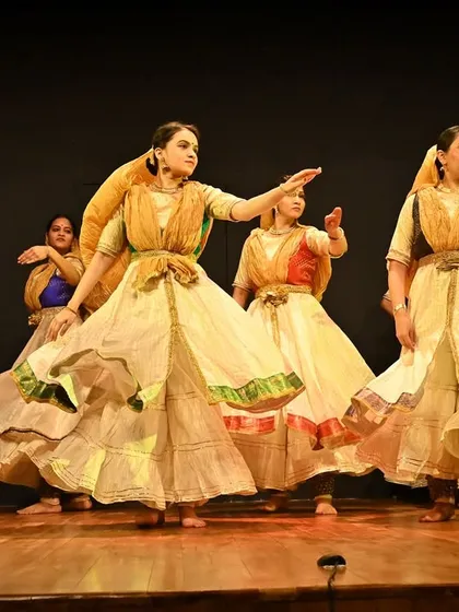 My ensemble in a graceful, synchronized pose. This image highlights the elegance and coordination of a traditional group Kathak performance.